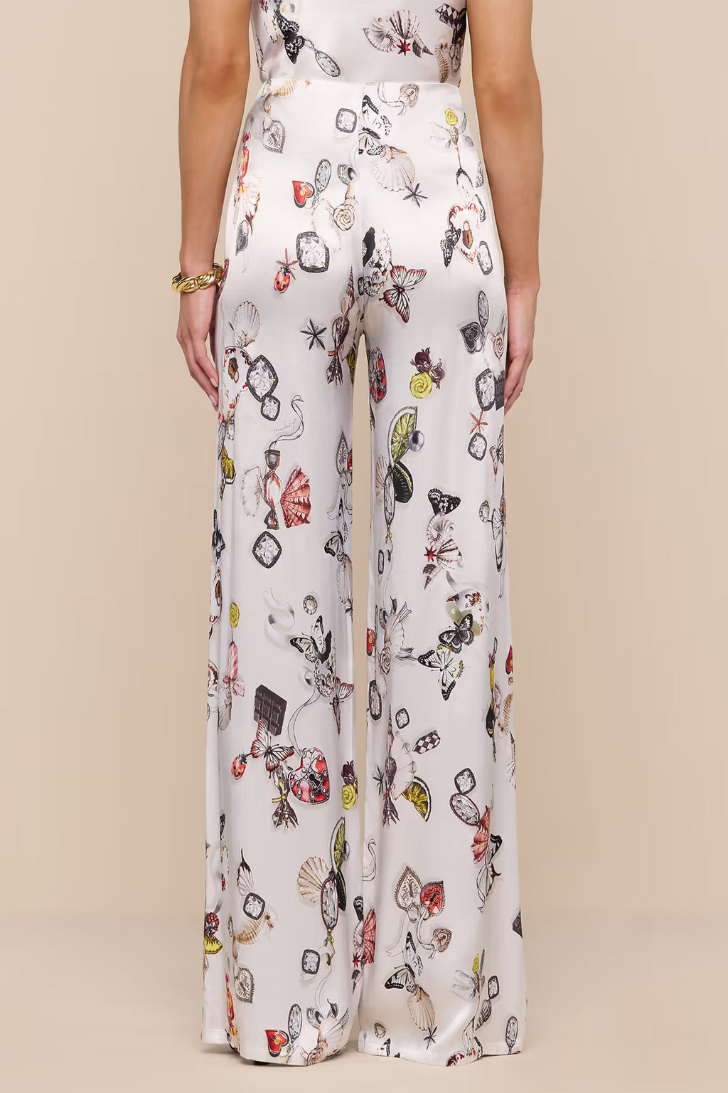 L'Agence Kimia ecru satin trousers, styled with matching camisole