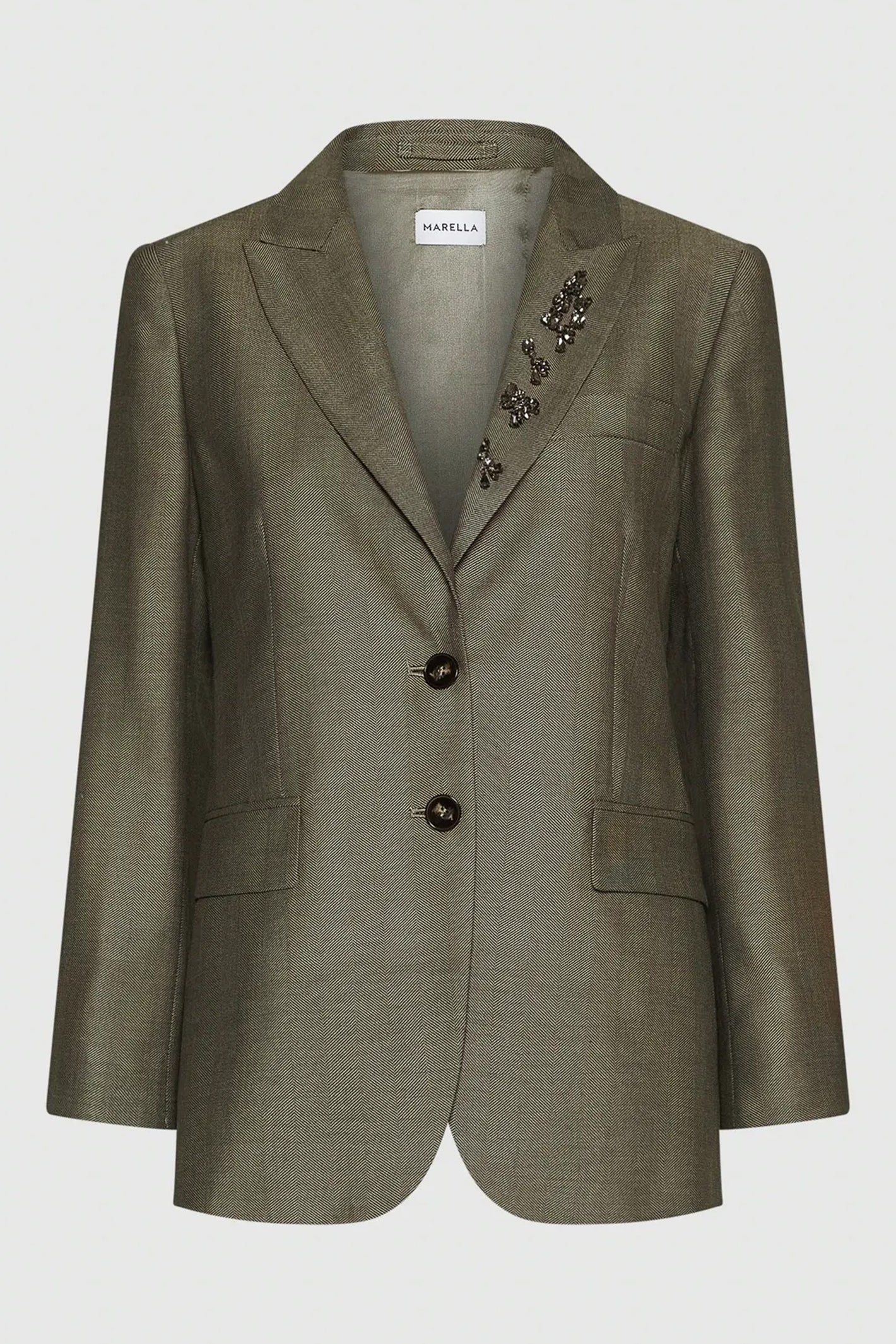 Green blazer with decorative buttons on a white background