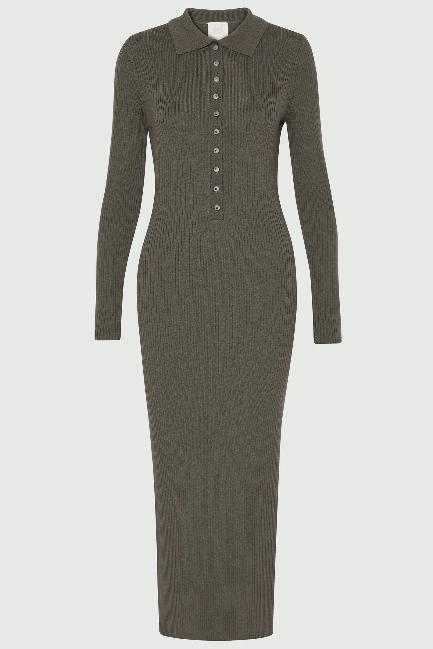 Green ribbed knit dress with collar on a light gray background