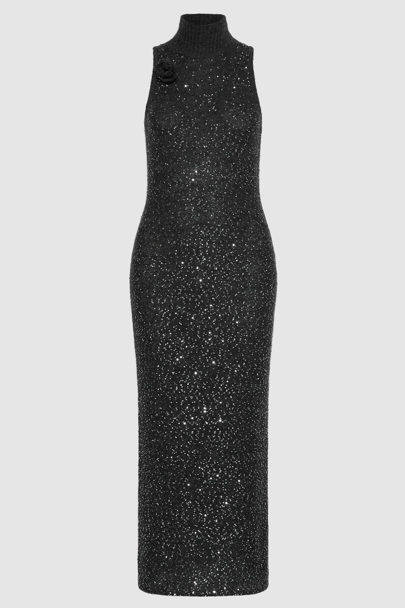 Black sequin dress on a light gray background