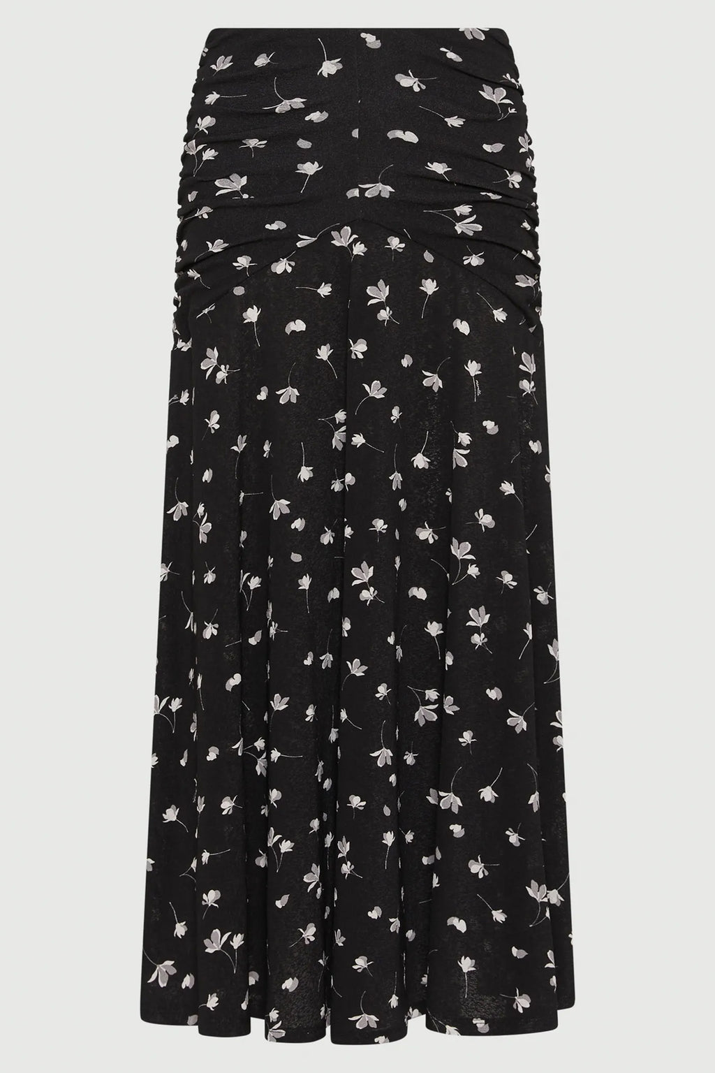 Black skirt with white floral pattern on a white background