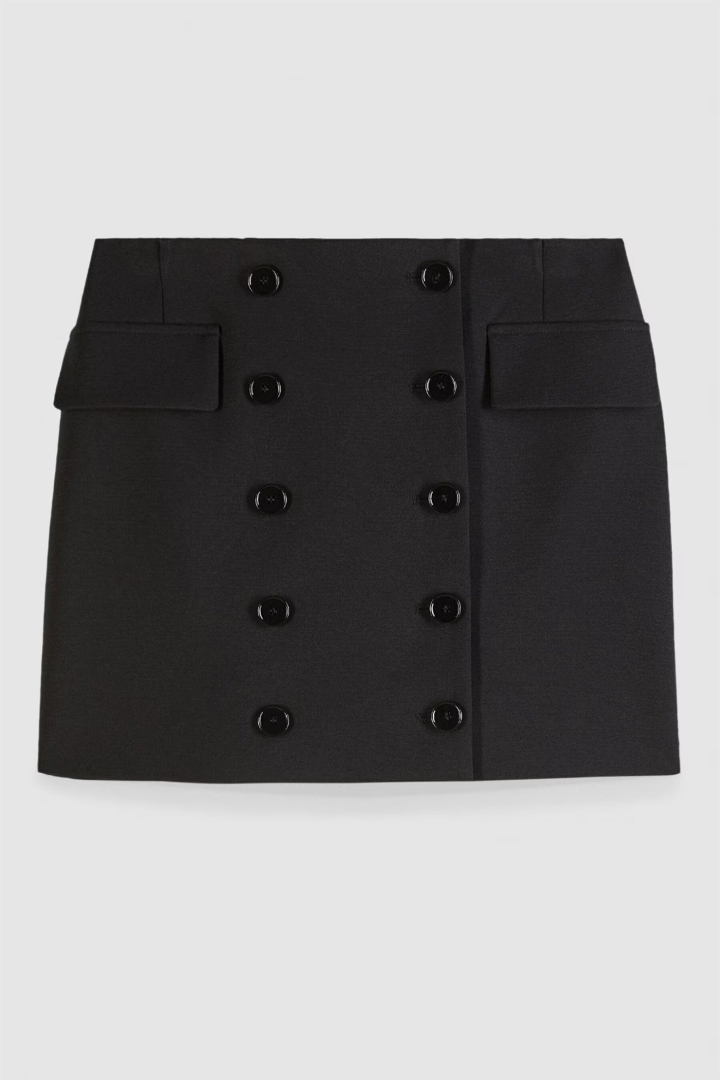 Black skirt with button details on a white background